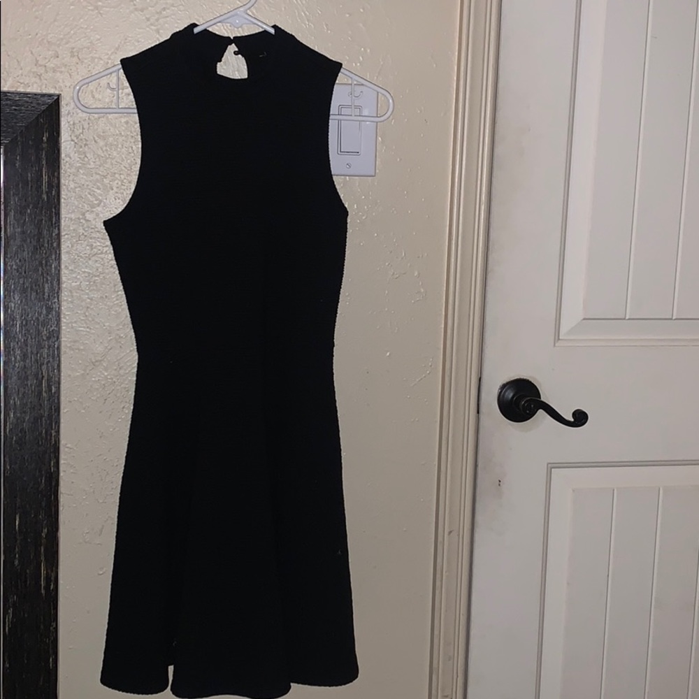 Black dress- tight fitted top flowy bottom
